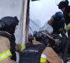 В Райском спасатели достали тело женщины из-под завалов и ликвидировали пожар (фото, видео)